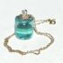 aqua glass gem pendant made from insulator
