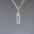 clear glass gem pendant made from insulator