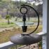 Suspension insulator plow disk bird feeder