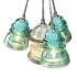 Cluster chandelier of insulator lights around a runway globe